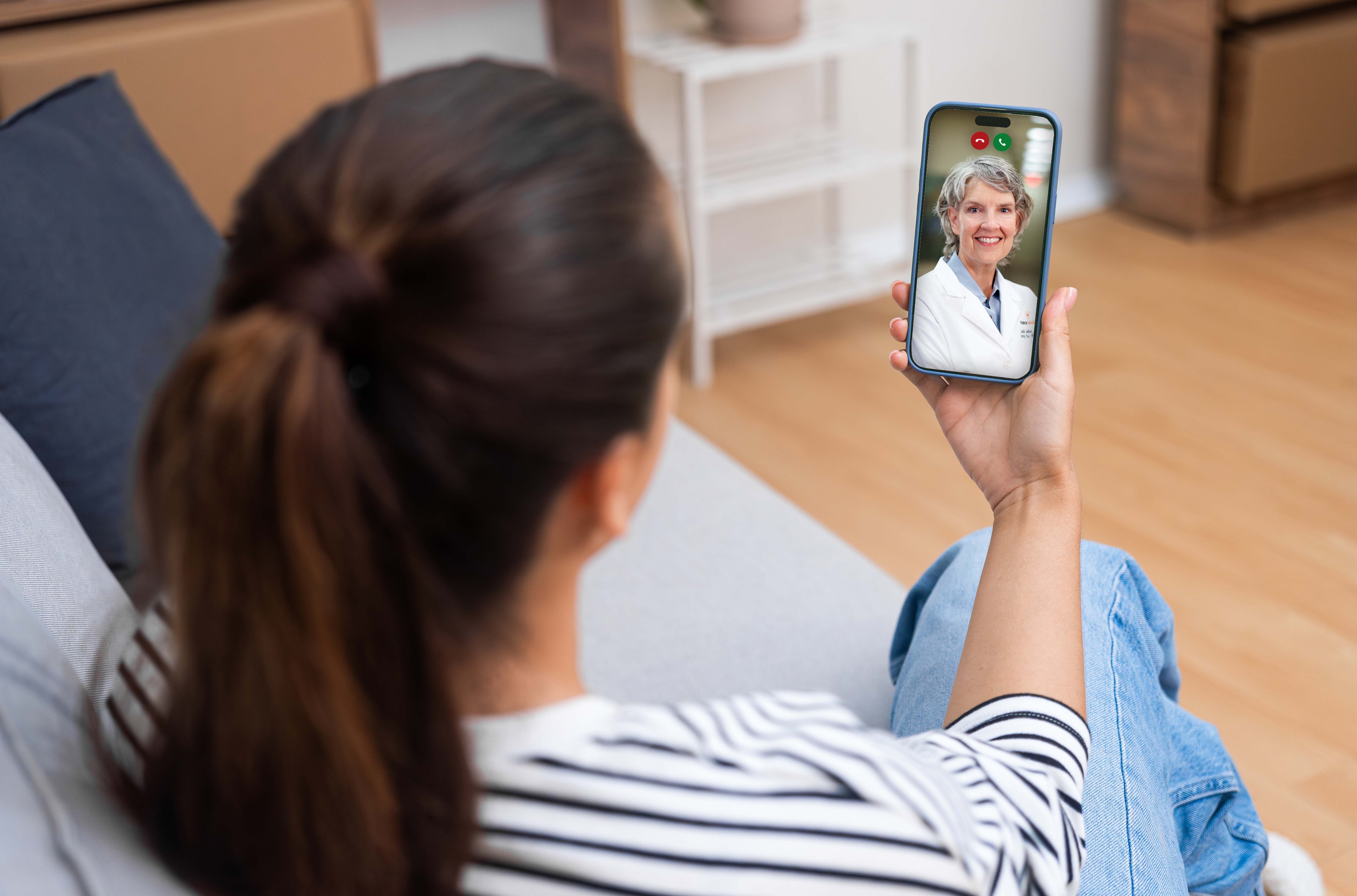 Patient using telehealth to meet with Mercer Medicine functional medicine nurse practitioner from home.